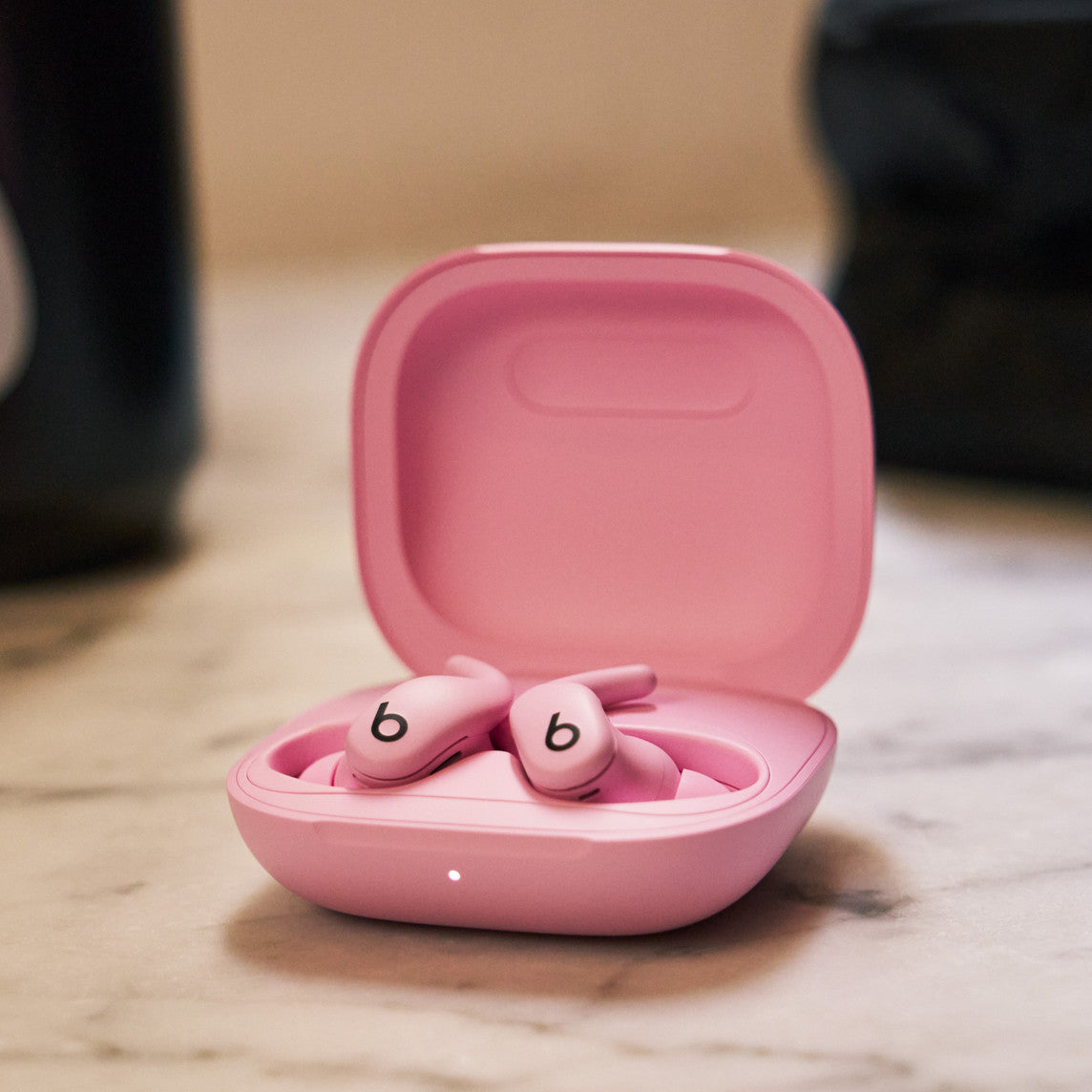 Powerbeats Fit — Audífonos inalámbricos para entrenamiento con ajuste seguro — Rosa intenso